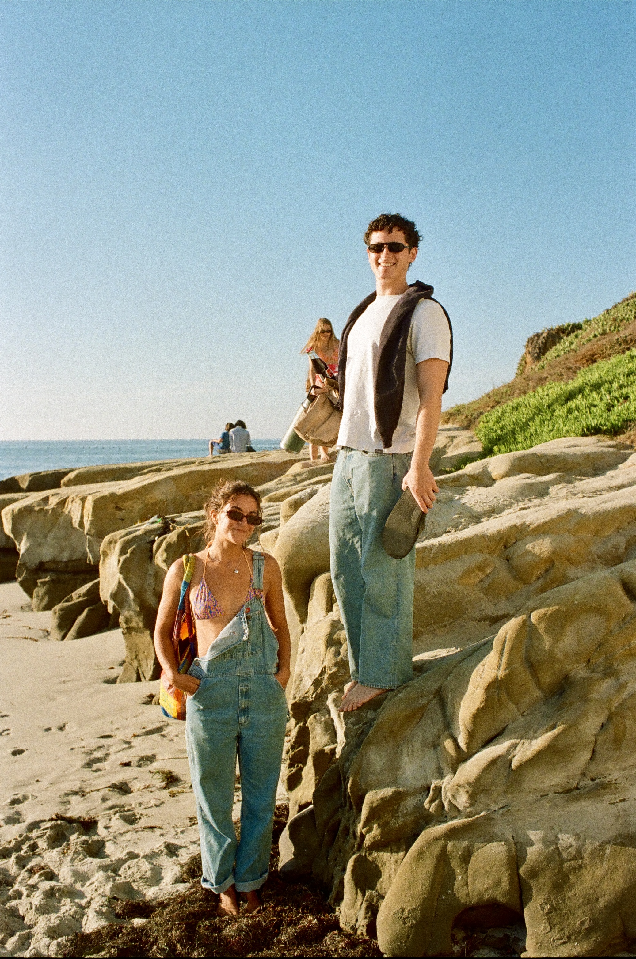 Two friends on the rocks at Bird Rock beach